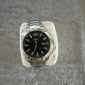 Men’s stainless fossil watch.